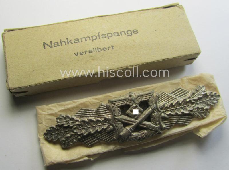 'Nahkampfspange in Silber' being a maker- (ie. 'FLL'-) marked so-called: '3rd pattern'-specimen that came in its (rare!) carton-based box