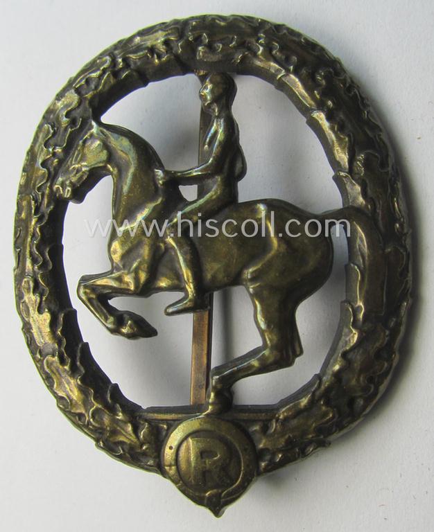 'Deutsches Reiterabzeichen der 3. Klasse (ie. 'in Bronze') being a maker- (ie. 'L.Chr. Lauer'-) marked example