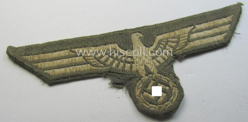 Clearly tunic-removed, WH (Heeres) very-early- (ie. pre)-war-period- and/or greyish-coloured breast-eagle (ie. 'Brustadler für Mannschaften u. Uffz.')