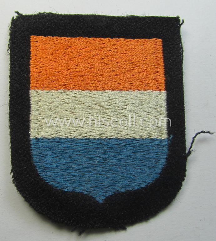 Dutch, Waffen-SS 'volunteer' arm-shield as was specifically intended for usage by soldiers of the: '23. SS Freiwilligen Panzer Grenadier Division' ('Nederland')