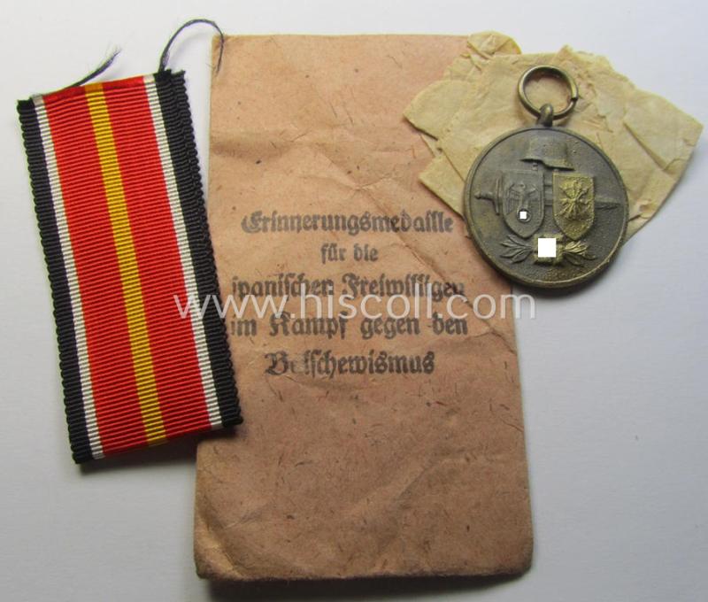 'Errinnerungsmedaille für die Spanischen Freiwilligen im Kampf gegen den Bolschevismus' being a (typical) non-maker-marked example by: 'Deschler & Sohn' in its 'Zellstoff'-based pouch