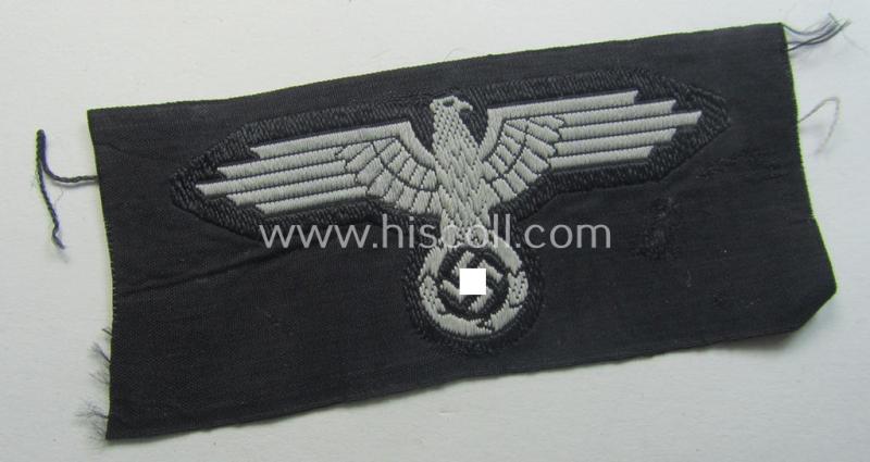 Mid- (ie. later-) war-pattern 'Waffen-SS'-type so-called: 'BeVo'-pattern, EM- (ie. NCO-) type side-cap eagle that comes in a never used- (ie. unconfectioned and 'virtually mint- ie. unissued'-), condition