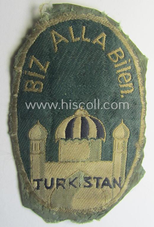 Truly worn 'BeVo'-type armshield (of the first pattern!) entitled: 'Biz Alla Bilen - Turkistan' (being a piece that was intended for a volunteer who served within the: 'Deutsche Wehrmacht' ie. within the: 'Turkistanisches Legion')