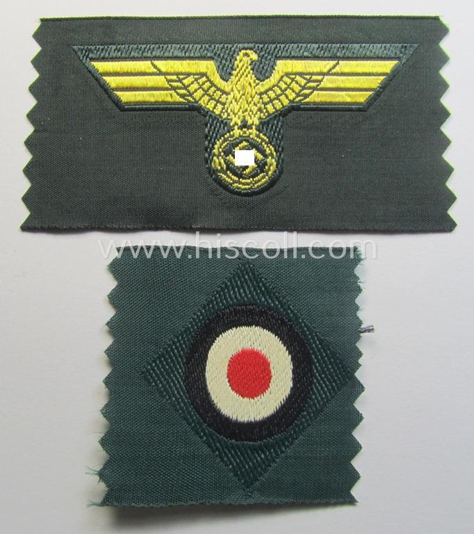 WH (KM ie. 'Küsten-Marine o. Marine-Art.') side-cap-eagle and cocarde-set (being a 'virtually mint- ie. unissued' set as executed in golden-yellow-coloured linnen on a darker-green-coloured background)
