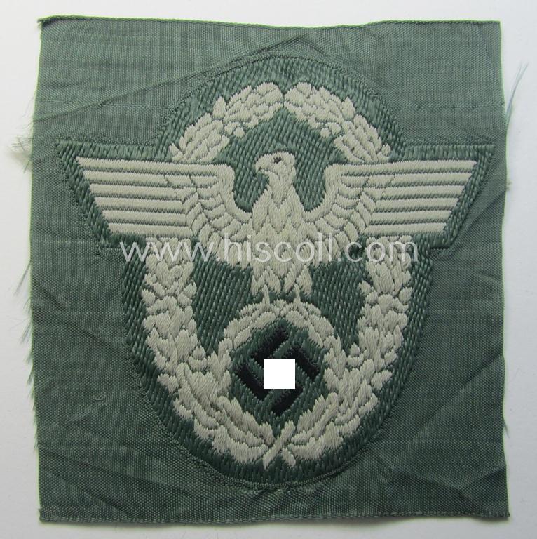 Police- (ie. 'Polizei'-) related armbadge (ie. arm-eagle) being a typical 'BeVo'-woven example