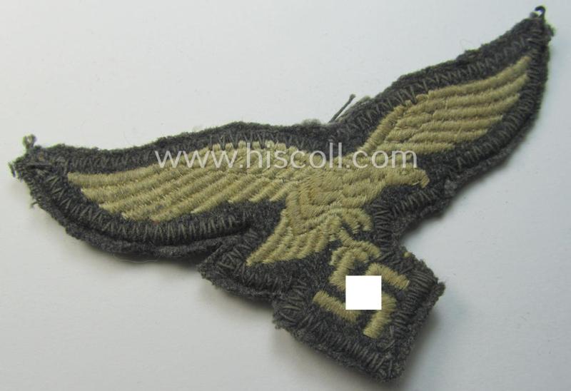 'Cut-out of a tunic' - WH (Luftwaffe) EM- (ie. NCO-) type breasteagle (ie. 'Brustadler für Mannschaften und Unteroffiziere der Luftwaffe')