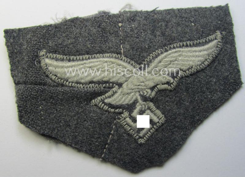 'Cut-out of a tunic' - WH (Luftwaffe) EM- (ie. NCO-) type breasteagle (ie. 'Brustadler für Mannschaften und Unteroffiziere der Luftwaffe')