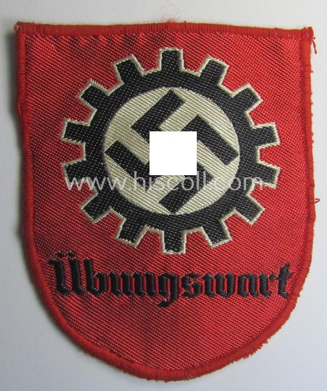 D.A.F.- (ie. 'Deutsches Arbeitsfront') specialist-armbadge (ie. 'Tätigkeitsabzeichen') as executed in neat 'BeVo'-weave pattern as was intended for a: 'D.A.F.-Übungswart'