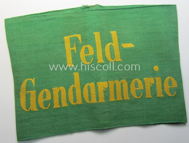 Wehrmacht-related, bright-green-coloured and/or linnen-based armband entitled: 'Feldgendarmerie' (as was specifically intended for usage by the staff of the notorious: 'Feldgendarmerie-Truppen')