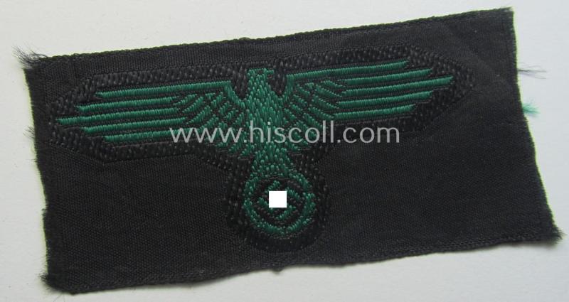 Typical reed-green-coloured, Waffen-SS, 'BeVo'-woven-styled cap-eagle (ie. 'Mützenadler für Tarn-Einheitsfeldmütze')