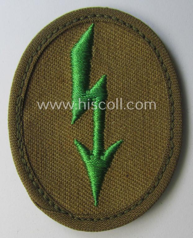 WH (Heeres) 'tropical-styled', trade- and/or special-career insignia (or: 'Signal Blitz') as was intended for a soldier who served within the: 'Panzer-Grenadier-Truppen'