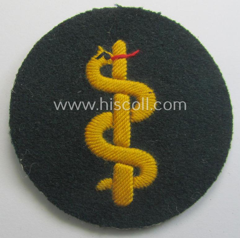 WH (Heeres) so-called: trade- and/or special-career arm-insignia as was intended for a: 'Sanitäter' being a neatly hand-embroidered (and maker-marked!) specimen