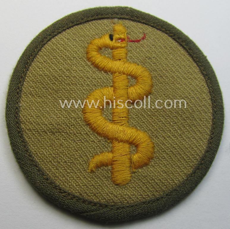 WH (Heeres) 'tropical'-issued, trade- and/or special-career insignia (ie. machine-embroidered 'Laufbahn- o. Tätigkeitsabzeichen') as was intended for an army: 'Sanitäter' (or medical-orderly)