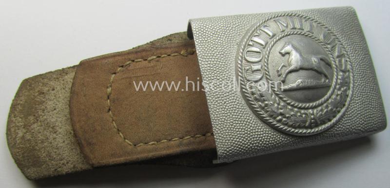 Bright-silver-coloured- and/or aluminium-based TR-period, fire-brigade- (ie. 'Feuerwehr'-) belt-buckle being a non-marked example that comes mounted onto its 'typically-shaped', leather-based tab