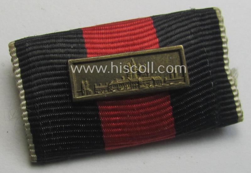 Single-pieced WH (Heeres etc.) ribbon-bar (ie. 'Band- o. Feldspange') that is showing the ribbon for a Czech 'Anschluss'-medal (and having a detailed- and larger-sized miniature 'Prager Burg-Spange' period-attached)