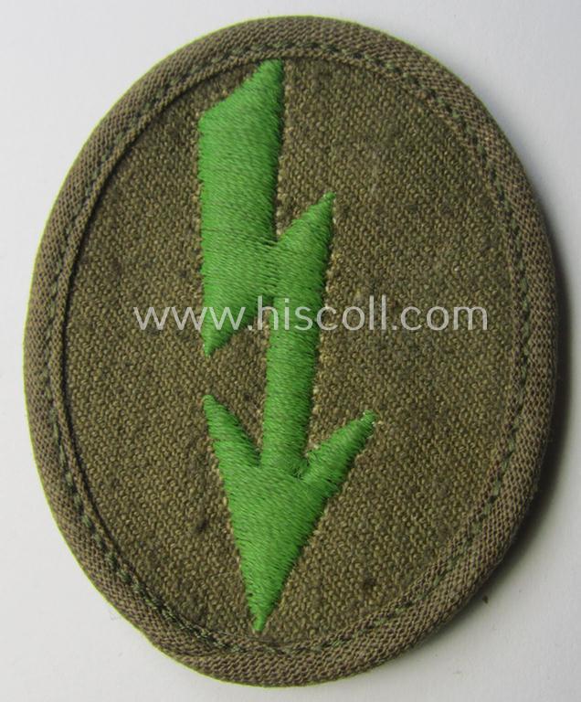 WH (Heeres) 'tropical-styled', trade- and/or special-career insignia (or: 'Signal Blitz') as was intended for a soldier who served within the: 'Panzer-Grenadier-Truppen'
