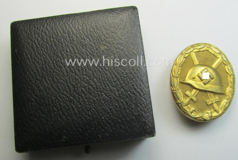 'Verwundeten-Abzeichen in Gold' being a maker- (ie. '30'-) marked- and typical 'Buntmetall'-based 'flat-pinned'-example that comes stored in its maker- (ie. 'Hauptmünzamt - Wien'-) marked- and period etui