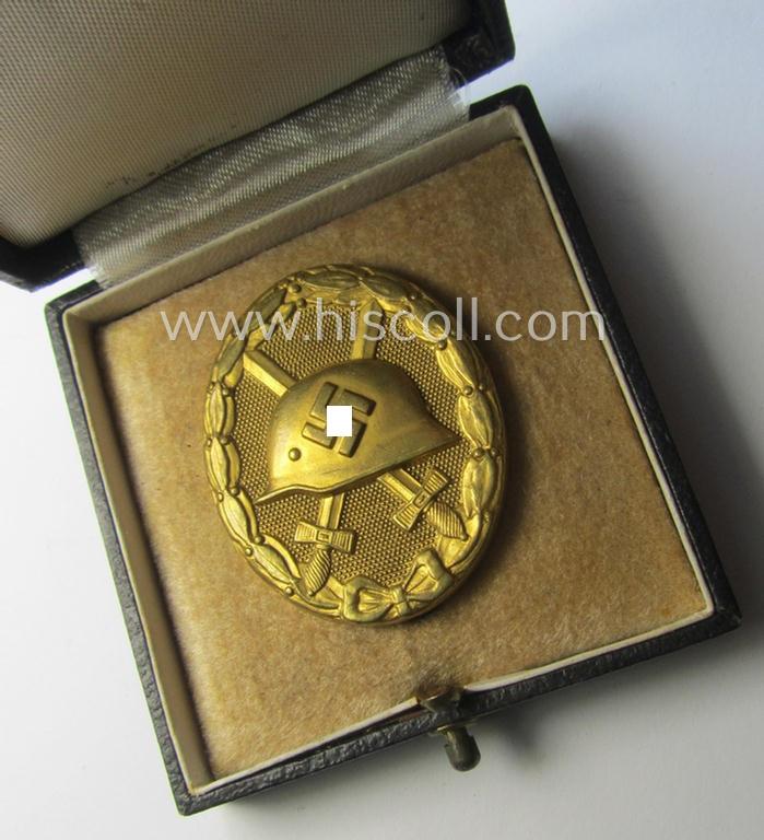 'Verwundeten-Abzeichen in Gold' being a maker- (ie. '30'-) marked- and typical 'Buntmetall'-based 'flat-pinned'-example that comes stored in its maker- (ie. 'Hauptmünzamt - Wien'-) marked- and period etui