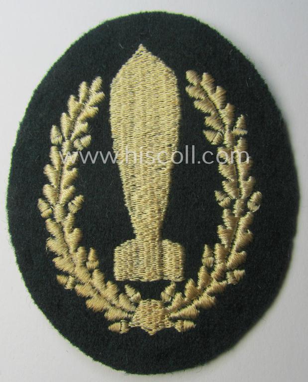 WH (Heeres) 'Nebelwerfer Richtkannonier'- (or: qualified smoke-troops canon-operator) patch as executed in the neat 'machine-embroidered'-pattern