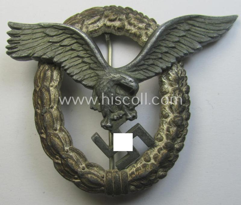Later-war-period WH (Luftwaffe) 'Flugzeugführer-Abzeichen' (or: pilots'-badge) being a typical zinc- (ie. 'Feinzink'-) based and/or non-maker-marked example by the: 'Friedrich Linden'- (ie. 'FLL'-) company