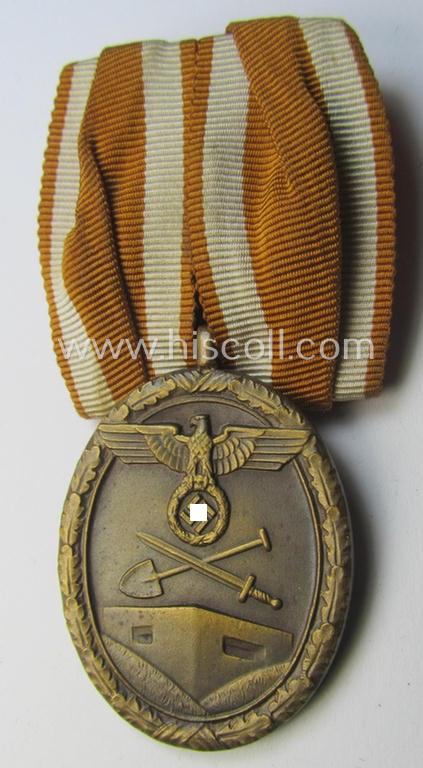 Single-pieced, non-detachable WH medal-bar (ie. 'Orden- o. Einzelspange') showing a: 'Deutsches Schutzwall Ehrenzeichen' (aka: 'Westwall'-medal)