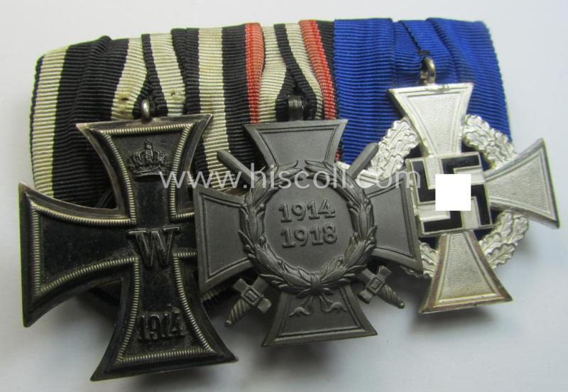 3-pieced 'WWI'- (ie. TR-) related medal-bar (ie. 'Ordenspange') resp. depicting a WWI-period: 'EK II.Kl.', a: 'FKK 1914-18' and a: 'TD-Ez. der 2. Kl.'