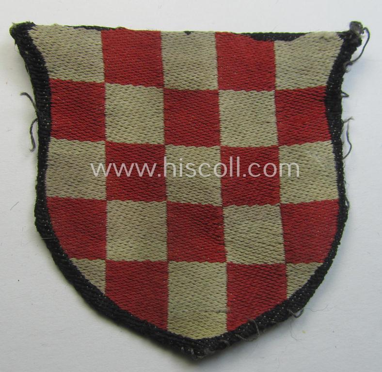 Truly used- and/or worn, multi-coloured- and/or 'BeVo'-woven armshield (ie. 'Ärmelschild') entitled: 'Hrvatska' as was intended for usage by a volunteer who served within the 'Deutsche Wehrmacht' ie. within the 'Kroatische Legion'