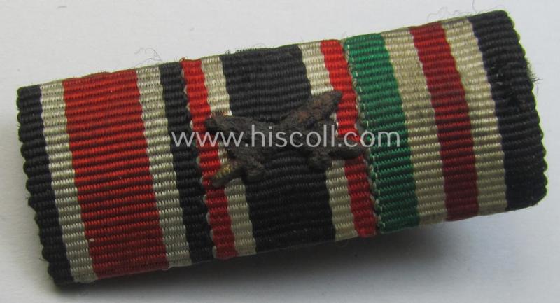 3-pieced ribbon-bar (ie. 'Band- o. Feldspange') showing resp. the ribbons for an: 'EKII. Klasse', a: 'KvK II.Kl. m. Schw.' and a: 'Deutsch-Italienische Feldzugsmedaille'