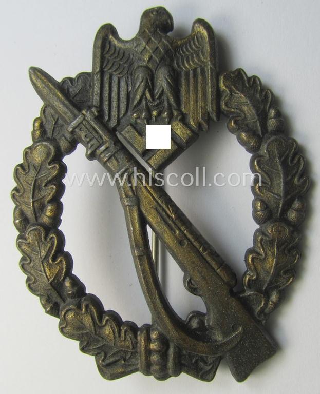 'Infanterie Sturmabzeichen in Bronze' being a maker- (ie. 'JFS'-) marked, 'solid-back' example by the desirable maker: 'Josef Feix u. Söhne' as was executed in golden-bronze-coloured, zinc-based metal