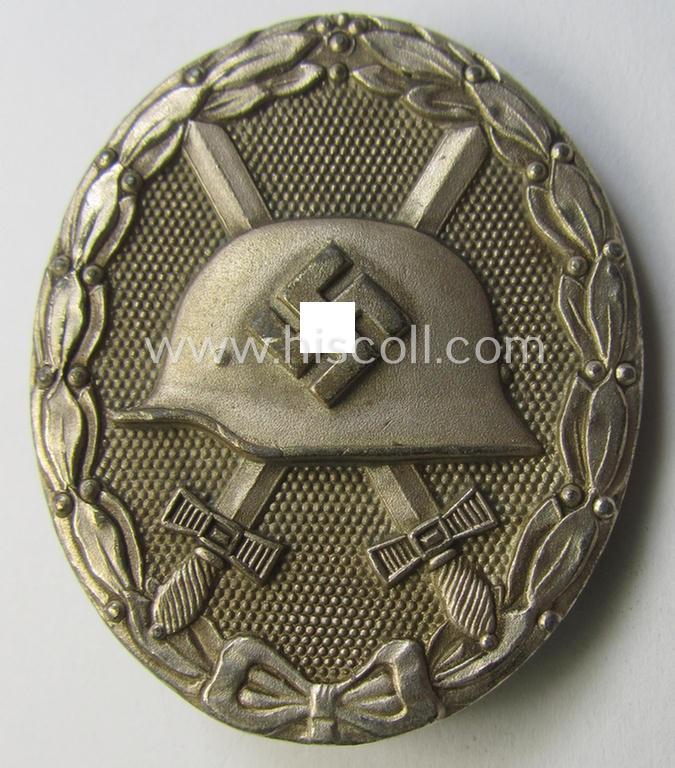 Silver-class wound-badge (or: 'Verwundeten-Abzeichen in Silber') being a maker- (ie. '65'-) marked example as was produced by the 'Hersteller' ie. maker: 'Klein u. Quenzer'
