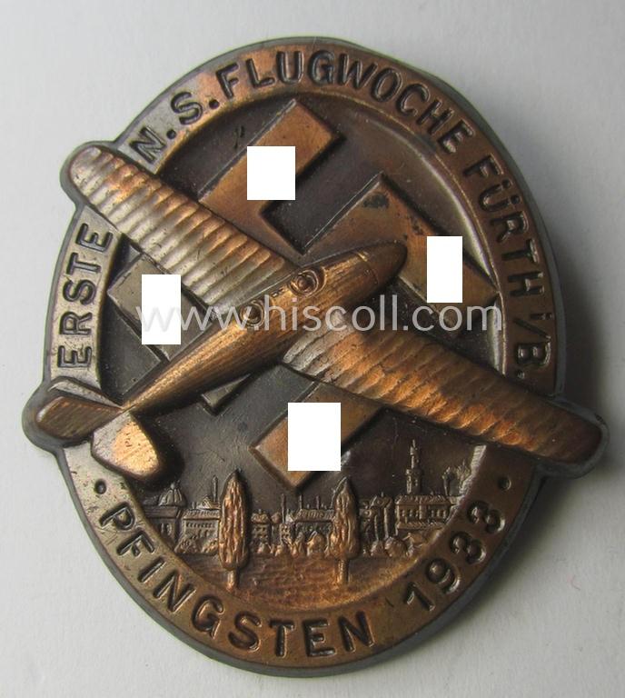 N.S.D.A.P.-related day-badge (ie. 'tinnie') as issued to commemorate a specific meeting entitled: 'Erste N.S. Flugwoche - Fürth i./B. - Pfingsten 1933'