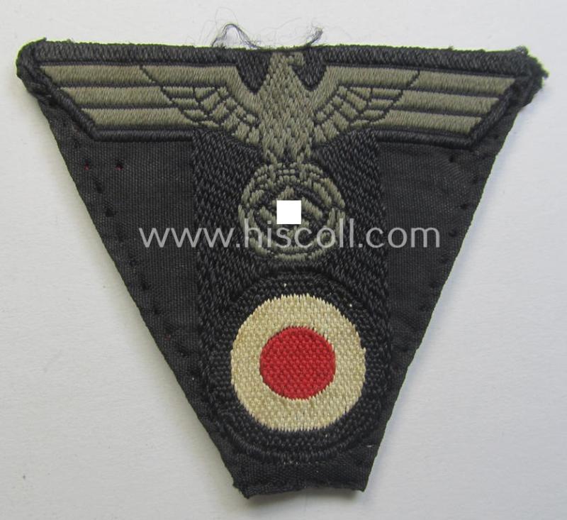 WH (Heeres) 'Panzer'-related, 'T-shaped'  ie. 'M42'-pattern cap-eagle/cocarde as executed in 'BeVo'-weave pattern (being a minimally stained example that comes in a clearly used- ie. once cap-attached, condition)