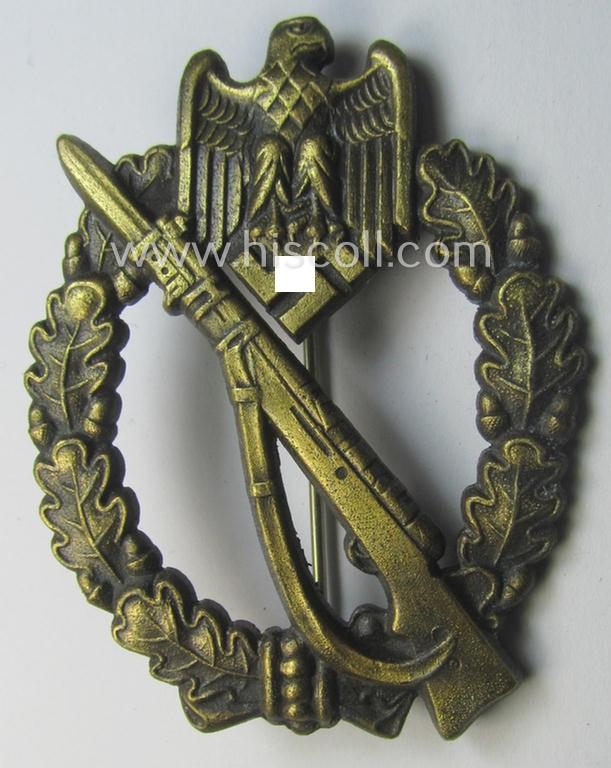 'Infanterie Sturmabzeichen in Bronze' being a maker- (ie. 'JFS'-) marked, 'solid-back' example by the desirable maker: 'Josef Feix u. Söhne' as was executed in golden-bronze-coloured, zinc-based metal