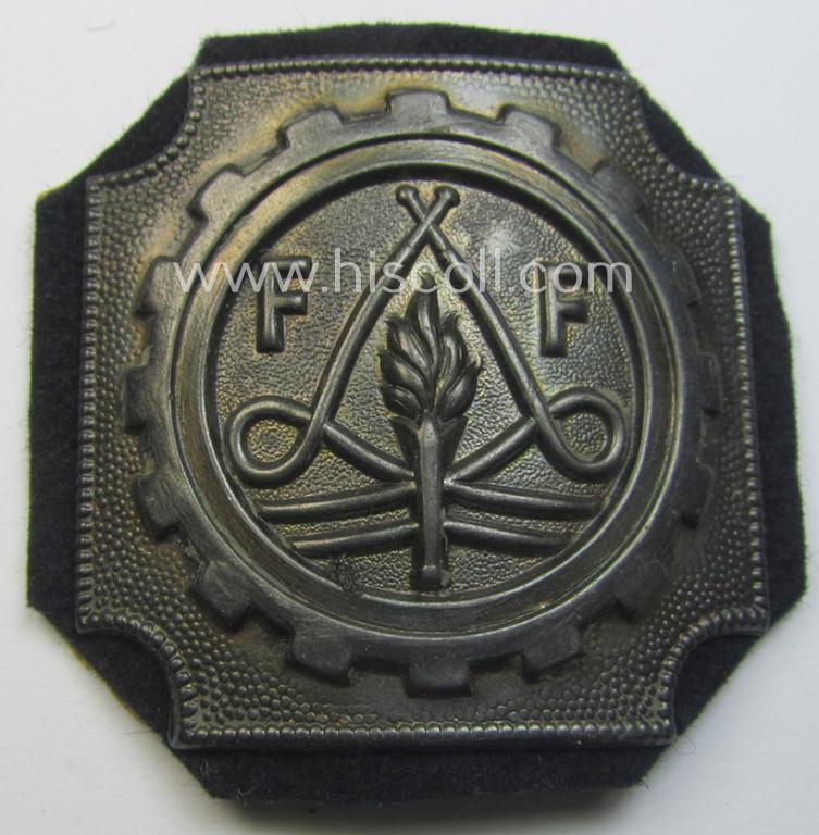 Never before (by me) encountered, WWII- (ie. TR-) period, zinc-based fire-brigade (ie. 'Feuerwehr'-) related breast-badge as was (I deem) specifically intended for: 'Freiwilligen Feuerwehr'-staff