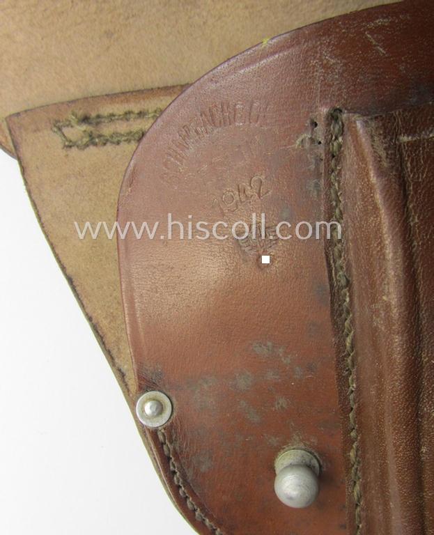 WH (Heeres, LW etc.) reddish-brown-coloured- and/or genuine leather-based, so-called: 'Mauser 7.65 mm. Pistole'-soft-shell holster being a neatly maker- (ie. 'Schambach & Co. - Berlin'-) marked, 'WaA'-stamped and/or: '1942'-dated example