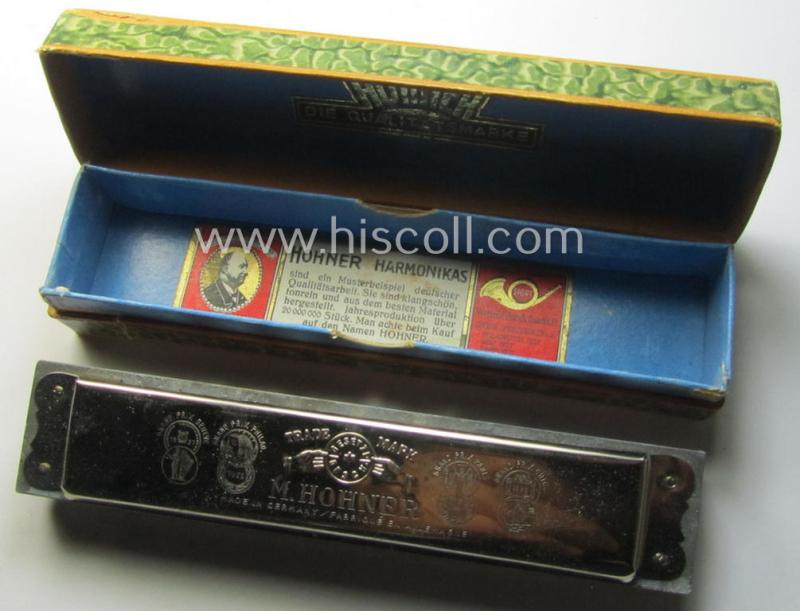 TR-era- (ie. 'Deutsche Wehrmacht'-) related harmonica entitled: 'Wenn wir Marschieren' that came stored in its original and/or carton-based box ie. etui