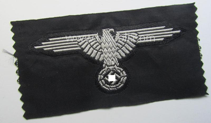 Mid- (ie. later-war-) pattern, 'SS' (ie. 'Waffen-SS') so-called: 'BeVo-weave-style', enlisted-mens'- ie. NCO-pattern arm-eagle (ie. 'Ärmeladler für Mannschaften u. Unterführer') as was intended for usage by the various Waffen-SS-troops