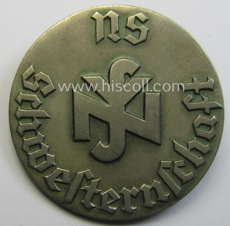 N.S.S. (ie. 'Nationalsocialistische Schwesternschaft') membership-badge as executed in silver-toned 'Buntmetall' as was specifically intended for: 'Lernschwester und Anwärterinnen'
