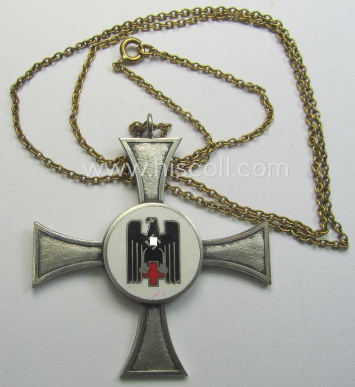 Neatly enamelled 'DRK-Schwesternkreuz des 2. Modell' that comes together with its (I deem non-period) silverish-golden-toned chain (ie. 'Kettchen') as issued and/or stored for decades