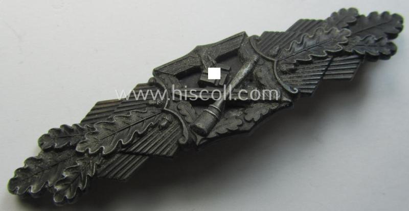 'Nahkampfspange in Bronze' (or: bronze-class close-combat clasp ie. CCC) being a (typical) non-maker-marked- and/or minimally converse-shaped specimen as was produced by the maker- (ie. 'Hersteller') 'Steinhauer & Lück'