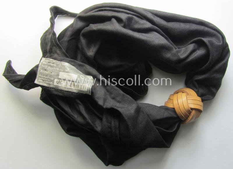 'HJ' ('Hitlerjugend') ie. 'BDM' (or: 'Bund Deutscher Mädel') so-called: 'Halstuch' as executed in typical black-coloured linnen still retaining its period RzM-etiket (and that comes with its leather-based 'Knote')