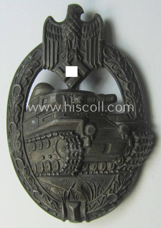 'Panzerkampfabzeichen in Bronze' (or: bronze-class panzer-assault badge or PAB) being a clearly maker- (ie. 'AS' in a triangle-) marked- and/or typical zinc- (ie. 'Feinzink'-) based specimen as was procuced by a to date unknown maker