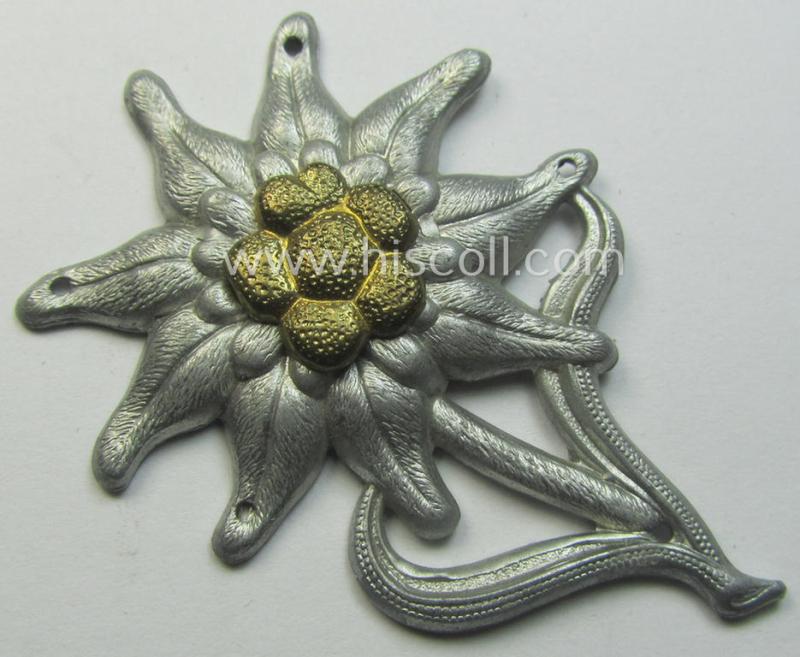 WH (Heeres) (bright) silverish-coloured, zinc-based (albeit non-maker-marked): 'M43'-pattern 'Edelweiss'-cap-badge (ie. 'Mützenabzeichen')