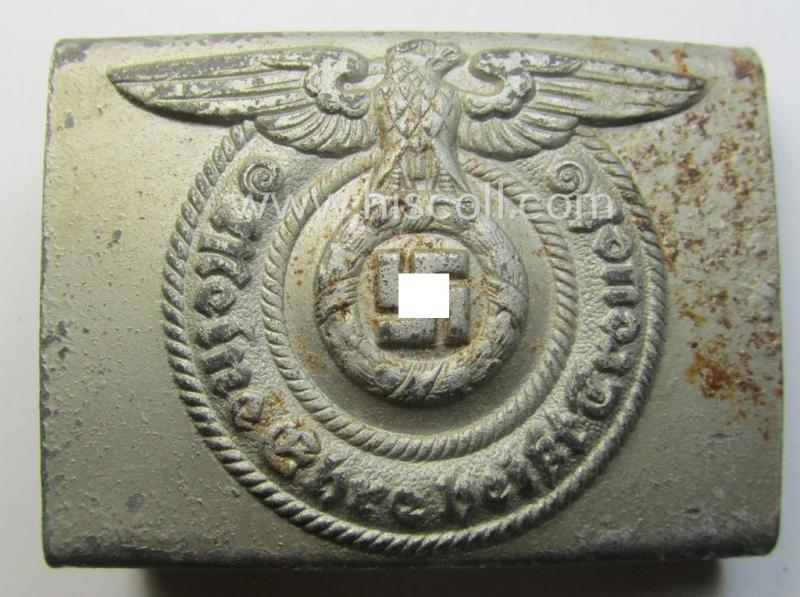 Waffen-SS enlisted-mens'- (ie. NCO-) type belt-buckle (being a typical, unmarked and typical steel-based: 'Overhoff & Cie'-example) that comes in a surely issued- and/or just moderately used- ie. worn, condition