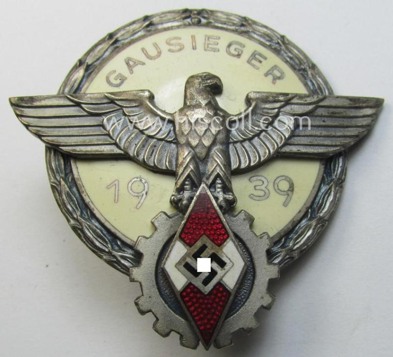 'Buntmetall'-based, 'HJ'- (ie. 'BDM'-) related so-called: 'Reichsberufswettkampf-Siegerabzeichen' (of the 2nd model) entitled: 'Gausieger 1939' and being a neatly maker- (ie.: 'G. Brehmer'-) marked example