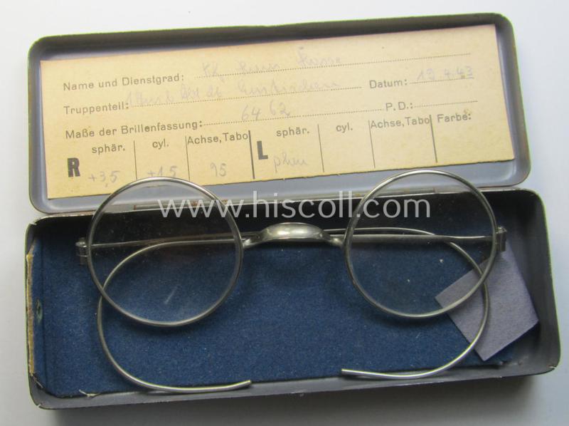 Pair of 'standard-issued'-pattern, WH-service-glasses (ie. 'Dienstbrille') as issued to a soldier named: 'Russe' (or alike) serving within the: '1. Art.Ausb.Abt. 26'