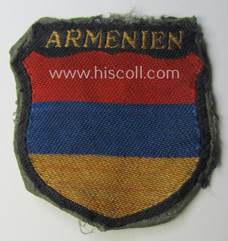Truly used- and/or worn, multi-coloured- and/or 'BeVo'-woven armshield (ie. 'Ärmelschild') entitled: 'Armenien' as was intended for usage by a volunteer who served within the 'Deutsche Wehrmacht' ie. within the 'Armenisches Legion'