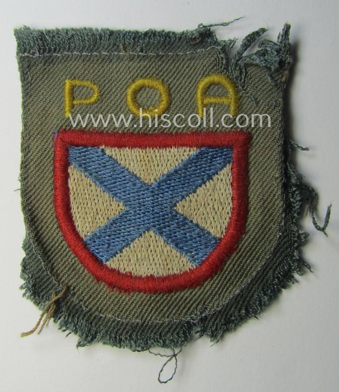 Truly used- and/or worn, multi-coloured and machine-embroidered- (ie. 'variant'-type) armshield as was intended for a Russian volunteer of the 'Russian Liberation Army' (ie. 'POA')