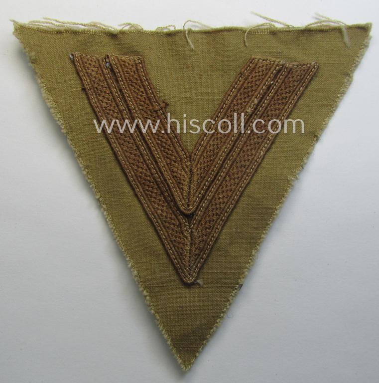 WH (Luftwaffe) tropical-styled, 'Armwinkel' (or: arm-chevron) as executed on typical beige- ie. tan-coloured linnen as was specifically intended for usage by a soldier with the rank of an: 'Obergefreiter'