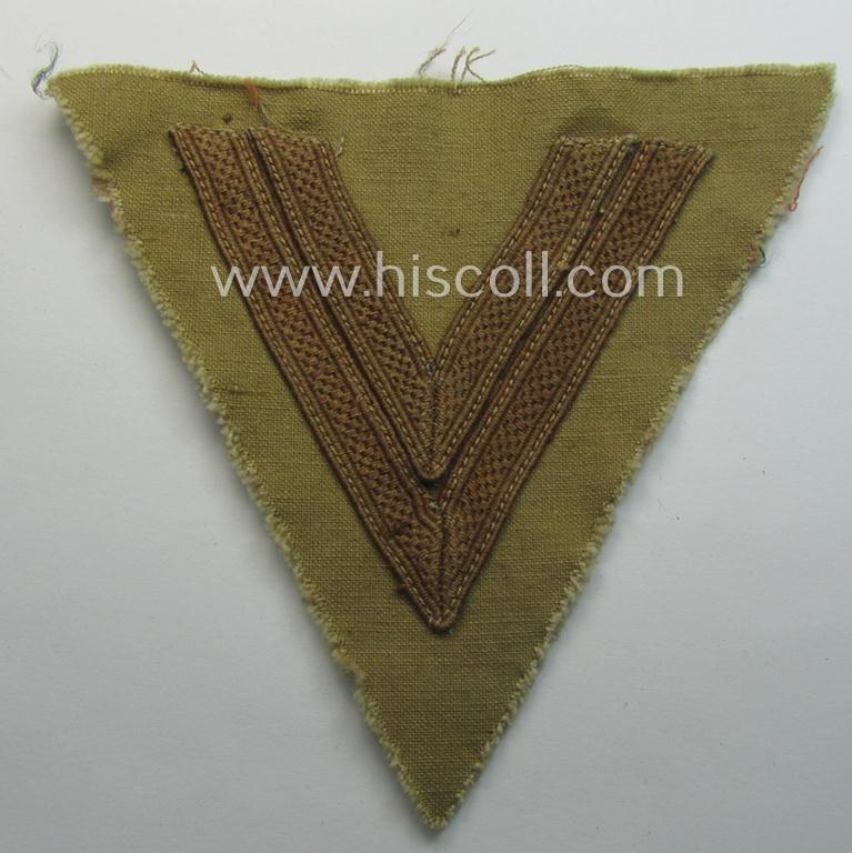 WH (Luftwaffe) tropical-styled, 'Armwinkel' (or: arm-chevron) as executed on typical beige- ie. tan-coloured linnen as was specifically intended for usage by a soldier with the rank of an: 'Obergefreiter'